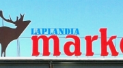 Логотип магазина Лапландия Маркет, располагаемого в Финляндии.